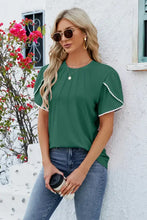 Round neck petal sleeve T-shirt in dark green with pintuck and pom-pom trim