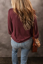 Women’s round neck puff sleeve T-shirt in maroon with light blue jeans