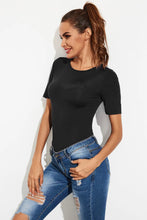 Black Short Sleeve Bodysuit with Ripped Jeans for Women