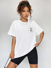 White short sleeve oversized t-shirt with ghost holding coffee cup graphic