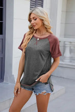 Women’s round neck short sleeve raglan t-shirt with distressed denim shorts