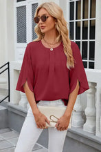 Women’s solid red round neck slit half sleeve top with pleats