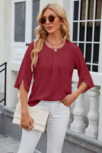 Round neck slit half sleeve burgundy pleated blouse with white pants