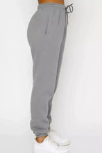 Gray sweatpants with drawstring waistband from Round Neck Sweatshirt and Joggers Set