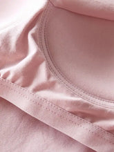 Soft pink round neck tank with seamless cotton bra featuring smooth stretchy fabric for comfortable wear