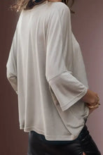 Light gray round neck three-quarter sleeve tunic top with wide sleeves