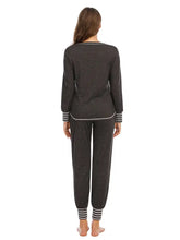 Dark gray heathered round neck top and pants lounge set with white striped cuffs and hem for comfortable wear
