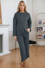 Dark gray quilted round neck top and pocketed pants lounge set with geometric pattern and long sleeve length