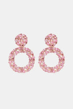 Pink round shape acrylic dangle earrings with sparkling rhinestone accents