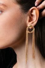 Round shape fringed copper tassel drop earring on ear