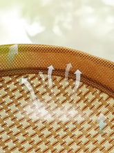 Round elevated woven pet bed with light brown bamboo mat and sturdy wood mesh border