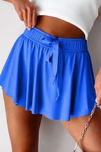 Royal blue pleated skirt with elastic waistband and drawstring