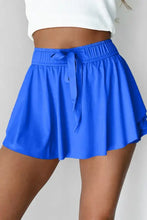 Royal blue skater skirt with elastic waistband and tie detail