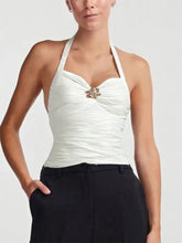 White ruched halter neck cami with gold toned floral brooch at center featuring elegant ruched halter detail