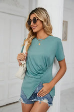 Woman in ruched hem detail crewneck t-shirt with regular sleeve length