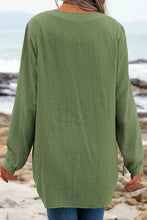 Loose-fitting ruched long sleeve olive green tunic with tie neck