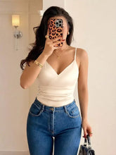 Leopard-print phone case beside a black ruched spaghetti strap bodysuit highlighting the strap bodysuit style
