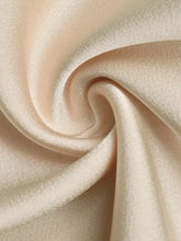 A cream-colored ruched satin spaghetti strap bodysuit with a smooth glossy finish and subtle sheen