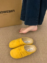 Bright yellow round toe flats loafers with gathered mule detailing
