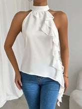 White halter neck sleeveless blouse with flowing ruffle detailing along the side perfect for elegant summer wear