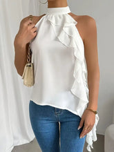 White ruffle halter neck sleeveless blouse with layered ruffles and high neckline made of lightweight fabric