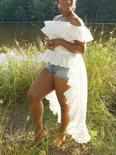 White off-shoulder ruffle blouse with layered high-low design in lightweight flowing fabric for elegant occasions