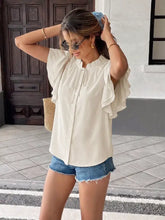 Off-white ruffle sleeve tie-neck blouse with short sleeves and elegant neck detail in lightweight fabric