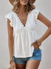 White eyelet lace ruffle sleeve v-neck blouse featuring short sleeves and delicate fabric texture for elegant wear