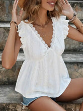 White eyelet lace ruffle sleeve v-neck blouse with short sleeves and delicate floral patterns for casual wear