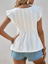 White eyelet lace ruffle sleeve v-neck blouse with peplum hem and short sleeves in a feminine design
