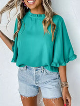 Teal ruffle trim half sleeve blouse with bell sleeves and ruffled trim detail in lightweight fabric