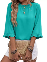 Turquoise ruffle trim half sleeve blouse with bell sleeves and ruffled neckline and cuffs for elegant wear
