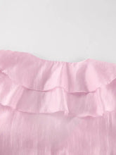 Delicate pink ruffle trimmed long sleeve blouse featuring soft flowing fabric and layered frills