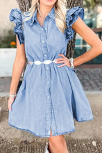 Blue denim dress with ruffled cap sleeves and white oval belt detail featuring button front design