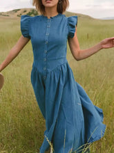 A blue denim dress with ruffled cap sleeves and a button-front design perfect for casual wear
