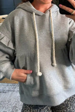 Gray oversized drawstring hoodie with white rope and ruffled sleeves machine wash cold for easy care