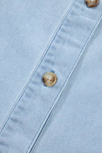 Light blue denim dress with ruffled edge collared shift and a single round gold-toned button machine wash cold