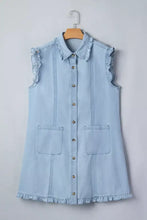 Light blue denim dress with ruffled edge collared trim, sleeveless design, and pockets, machine wash cold