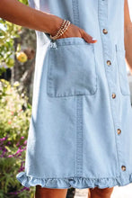Light blue denim dress with button front ruffled edge collared shift design and machine wash cold care instructions