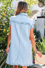 Light blue denim dress with ruffled edge collared sleeves and hem featuring pockets, machine wash cold care