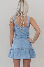 Light blue denim dress with thin straps, ruffled hem, and square neck denim design perfect for casual wear