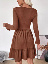 Brown ribbed knit long-sleeve dress with ruffled flared skirt and tiered hem