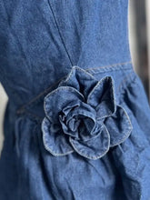 Denim dress with layered scoop neck in blue denim featuring a detailed denim rose embellishment