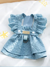 Light blue textured ruffled pet dress with front buckle and product measurements