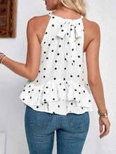 White halter neck cami top with black polka dots and ruffled printed halter hem for stylish wear