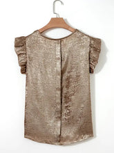 A shimmering gold metallic blouse with ruffled short sleeves and a ruffled round neck button-down front