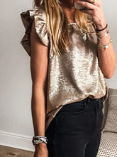 A shimmering gold metallic ruffled round neck tank with loose fit and ruffled sleeves for elegant wear