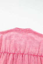 A soft pink textured fabric top with rounded neckline and gathered waistband for a denim mini dress look