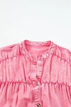 Soft pink textured cotton blouse with gathered neckline and buttons paired with ruffled short sleeve denim mini dress