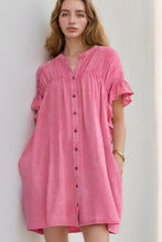 Soft pink loose-fitting denim mini dress with ruffled short sleeves and gathered neckline for casual wear